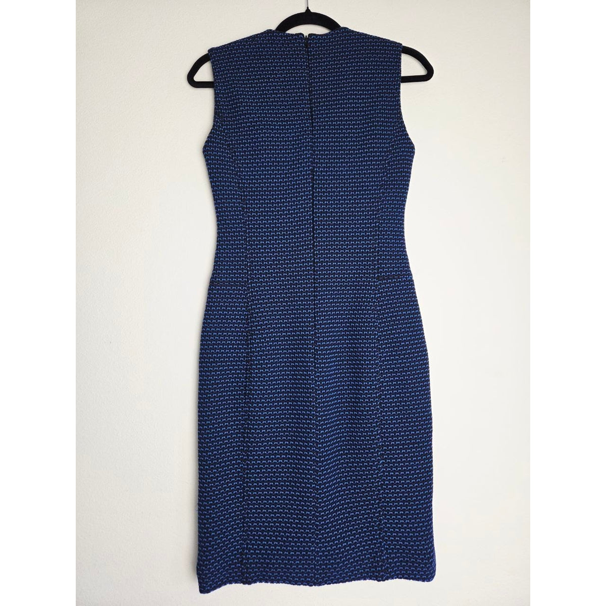Back view on hanger of Derek Lam blue and black sheath dress