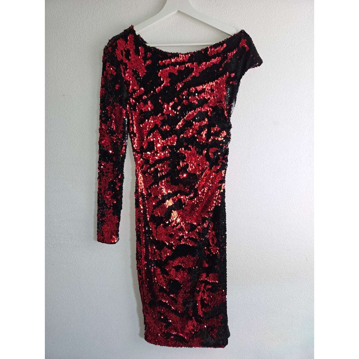 Front view on hanger of Delfi Valentina red and black sequin dress