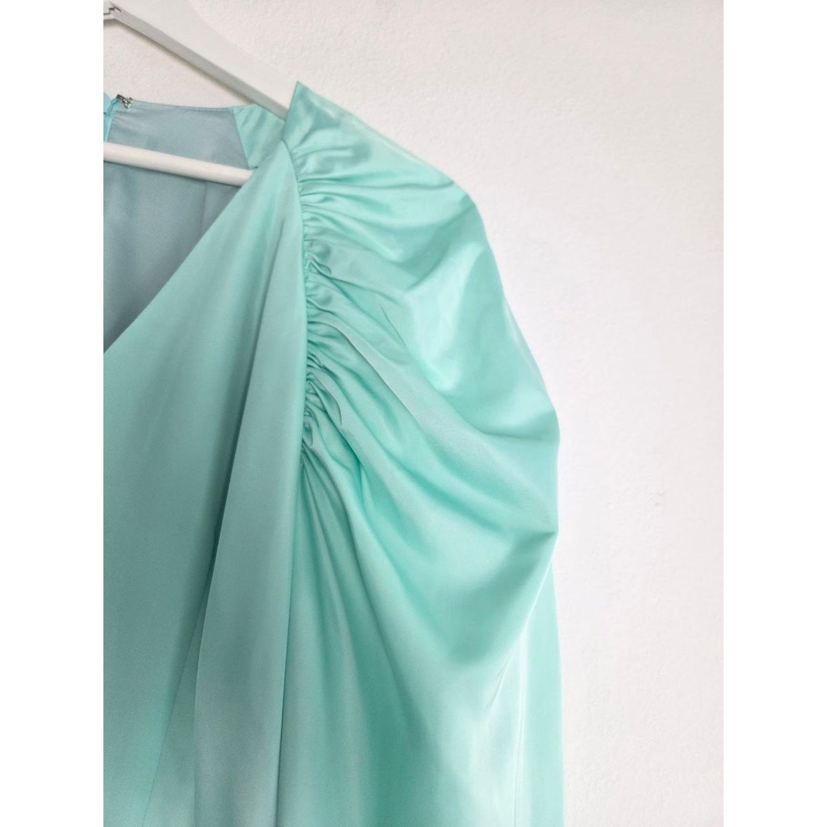 Gathered puff shoulder detail of ROTATE Morning Mist aqua mini dress
