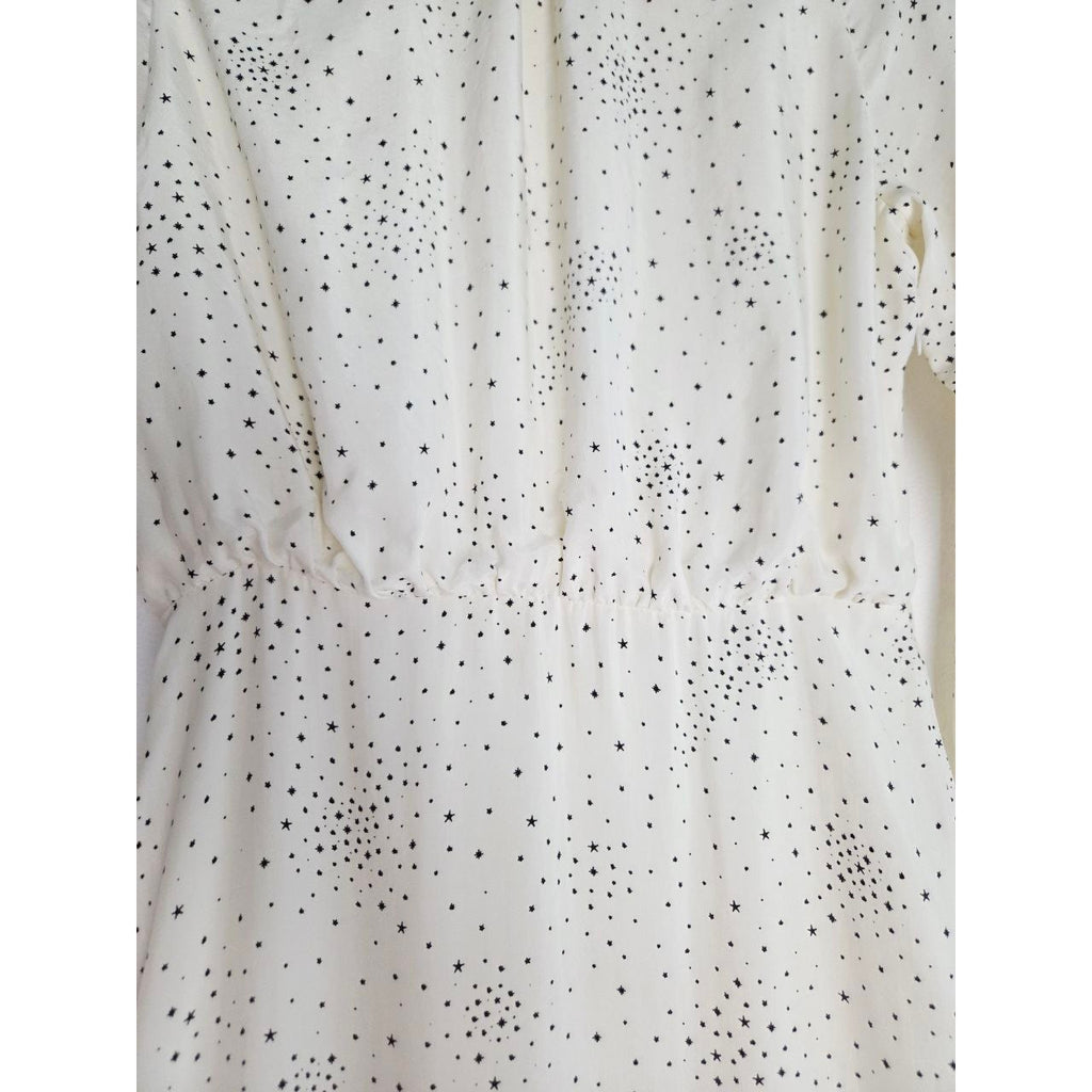 Defined waist detail of Maje Reto ecru star-print dress