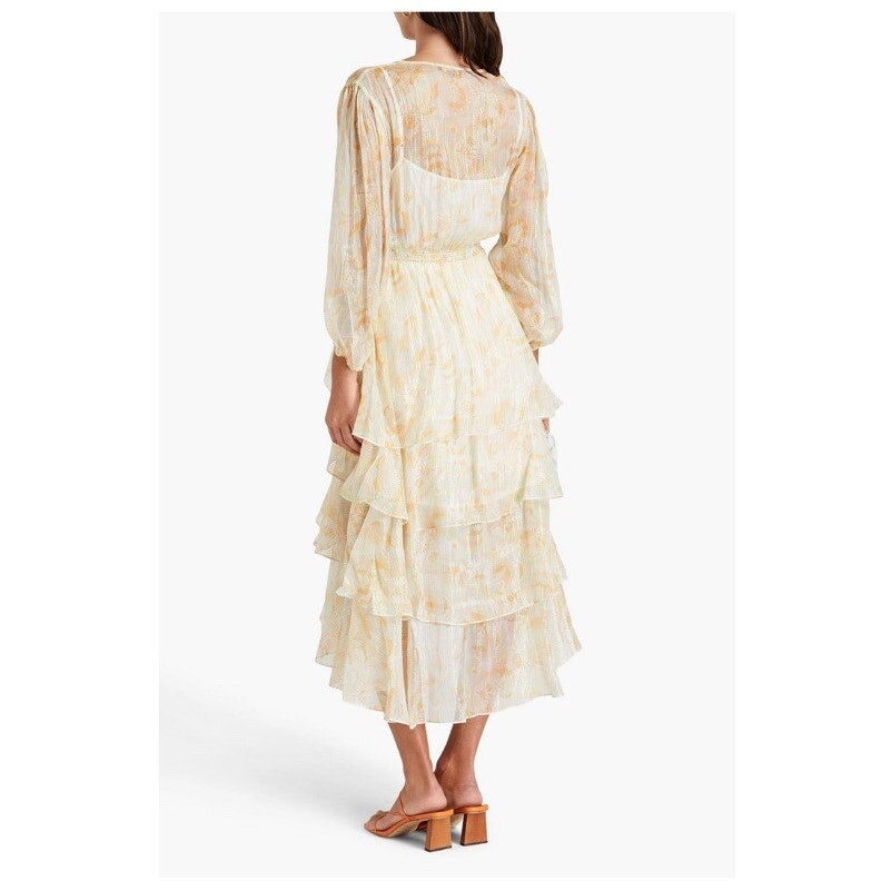 Model wearing dress from behind of Maje Rufflino metallic silk-blend maxi dress