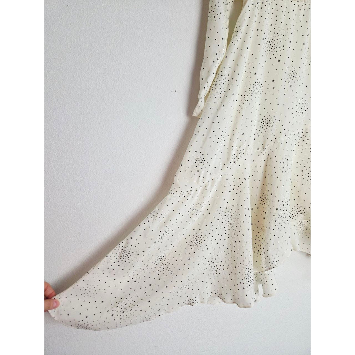 Flowing skirt and ruffle detail of Maje Reto ecru star-print dress