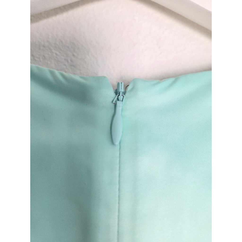 Back zipper close-up of ROTATE Morning Mist aqua mini dress