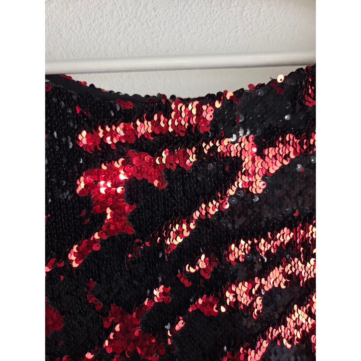 Red and black reversible sequin detail of Delfi Valentina red and black sequin dress