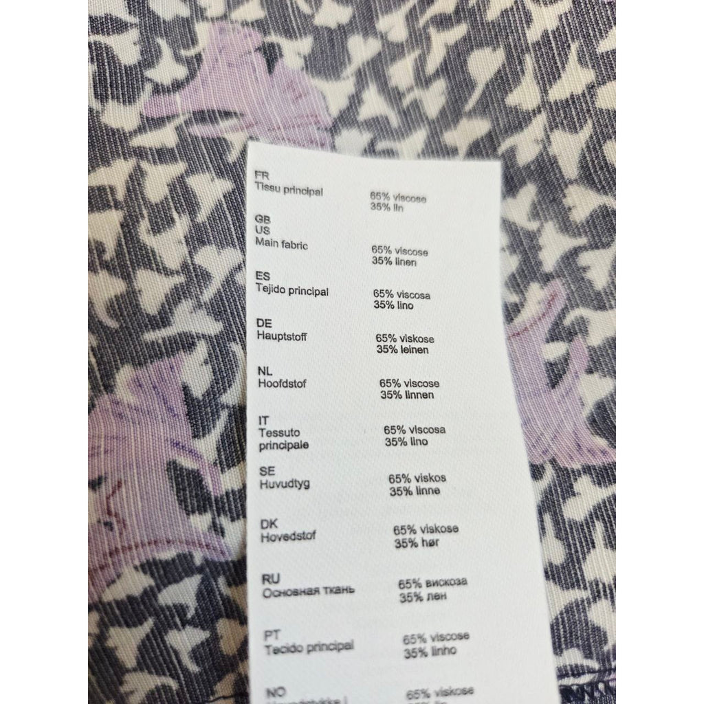 Composition label of Maje Rappa floral smocked mini dress