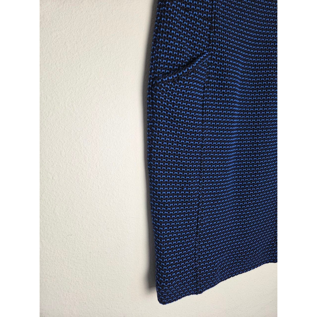 Hem detail of Derek Lam blue and black sheath dress