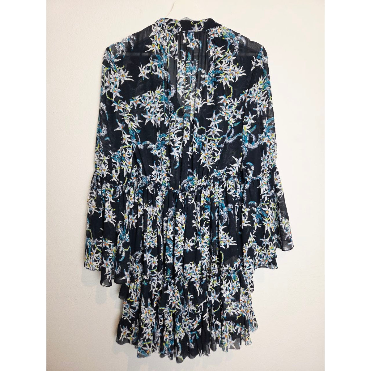 Back view on hanger of Cinq à Sept Lyra navy floral mini dress