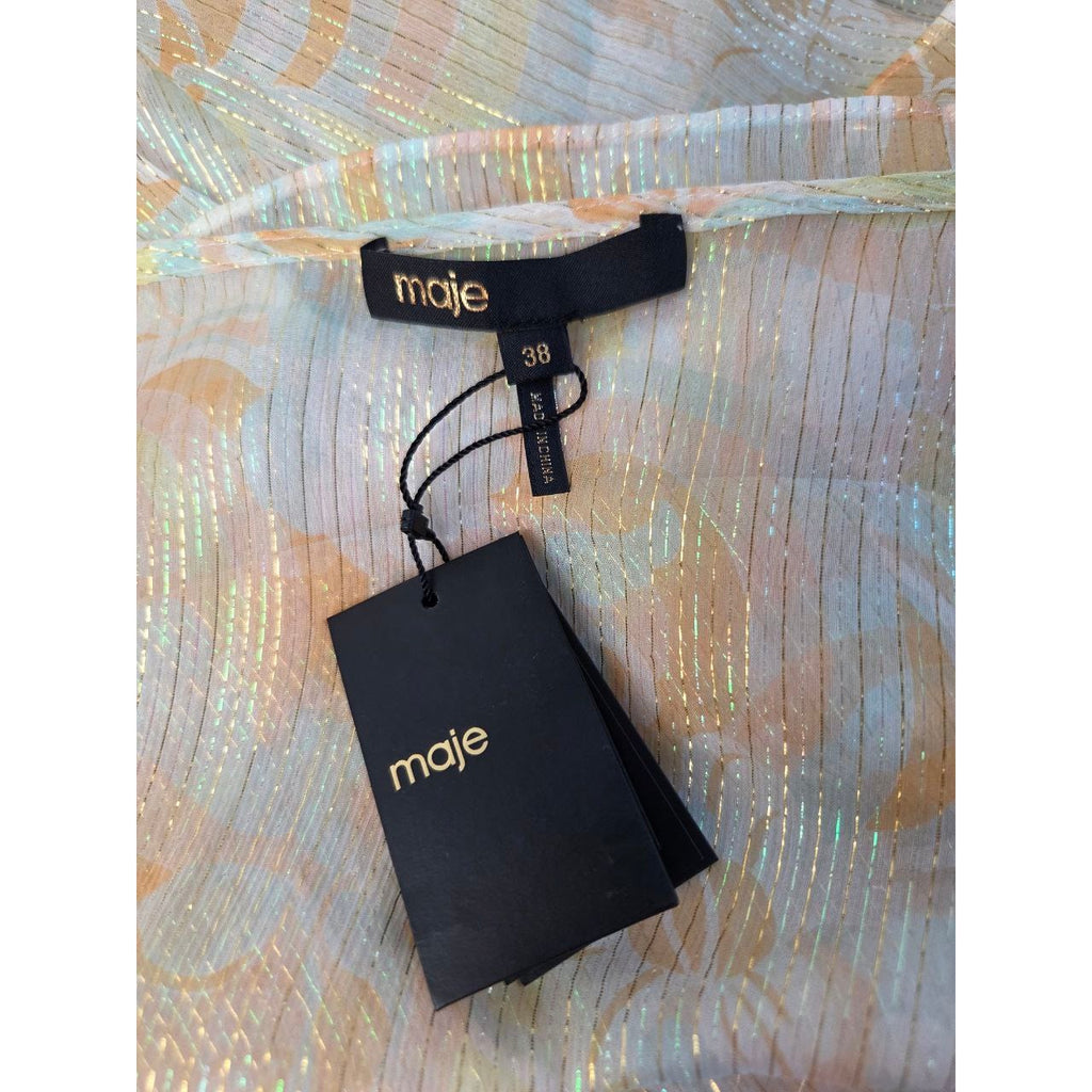 Brand label and attached hangtag of Maje Rufflino metallic silk-blend maxi dress