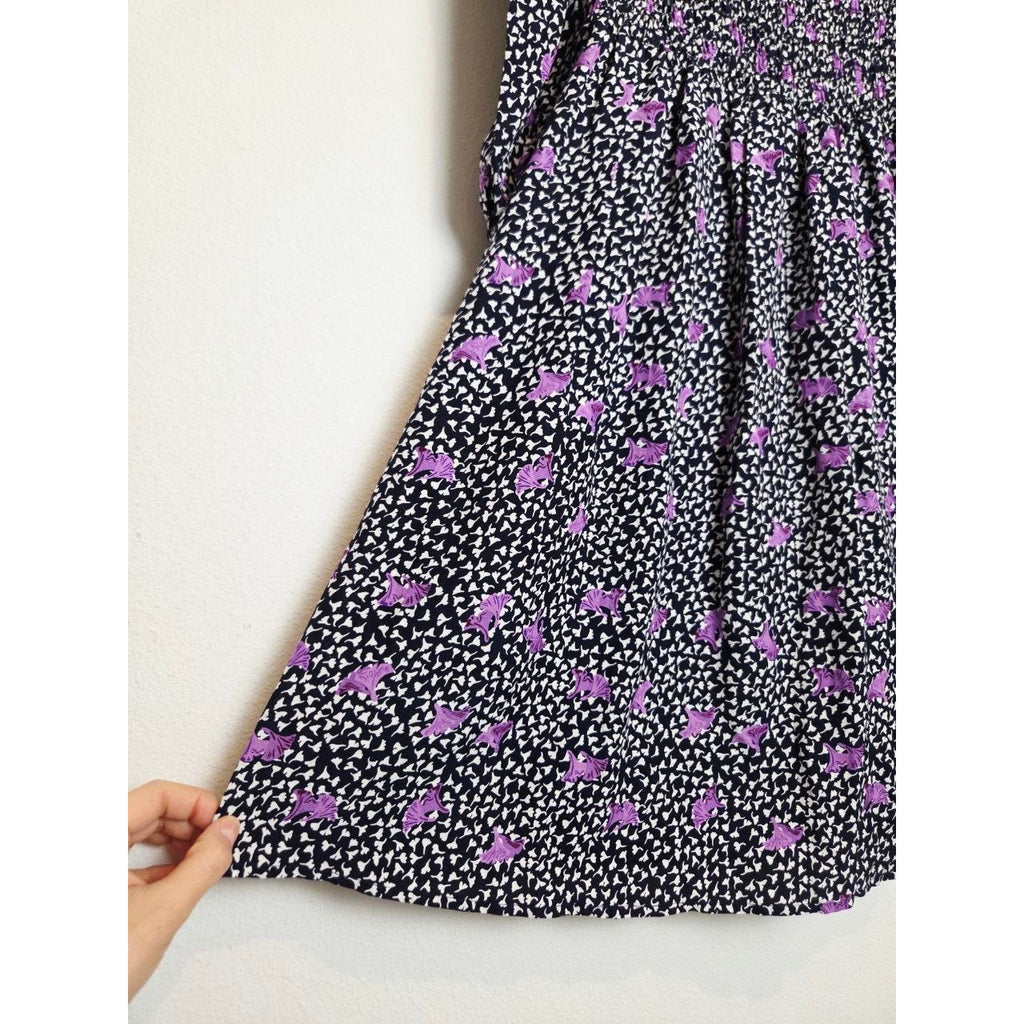 Floral skirt detail of Maje Rappa floral smocked mini dress