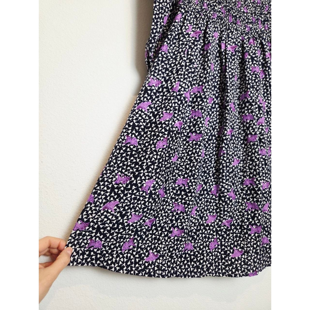 Floral skirt detail of Maje Rappa floral smocked mini dress