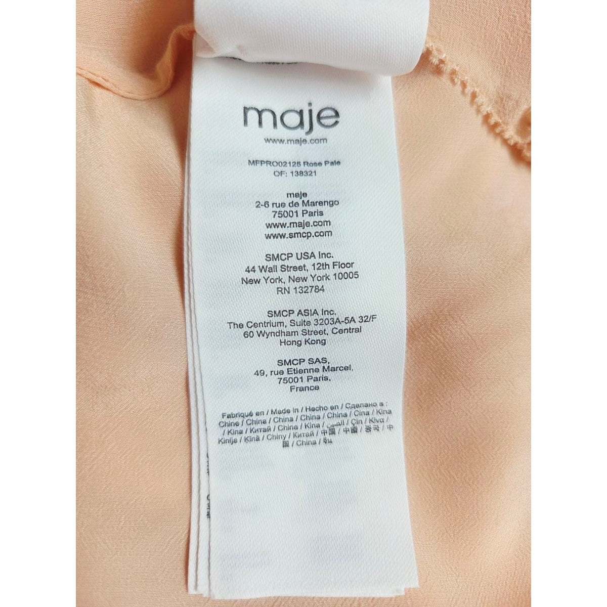 Fabric information label of Maje Riava blush mini dress