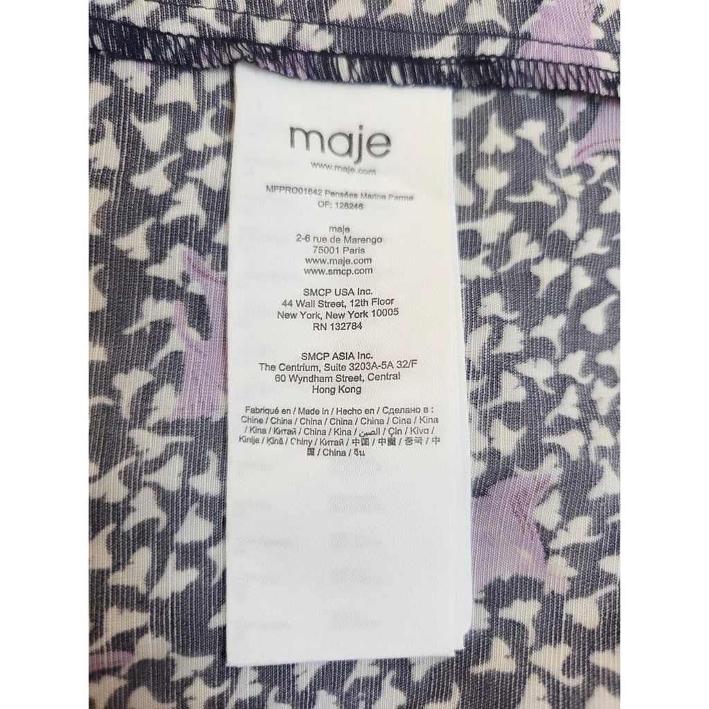 Fabric information label of Maje Rappa floral smocked mini dress