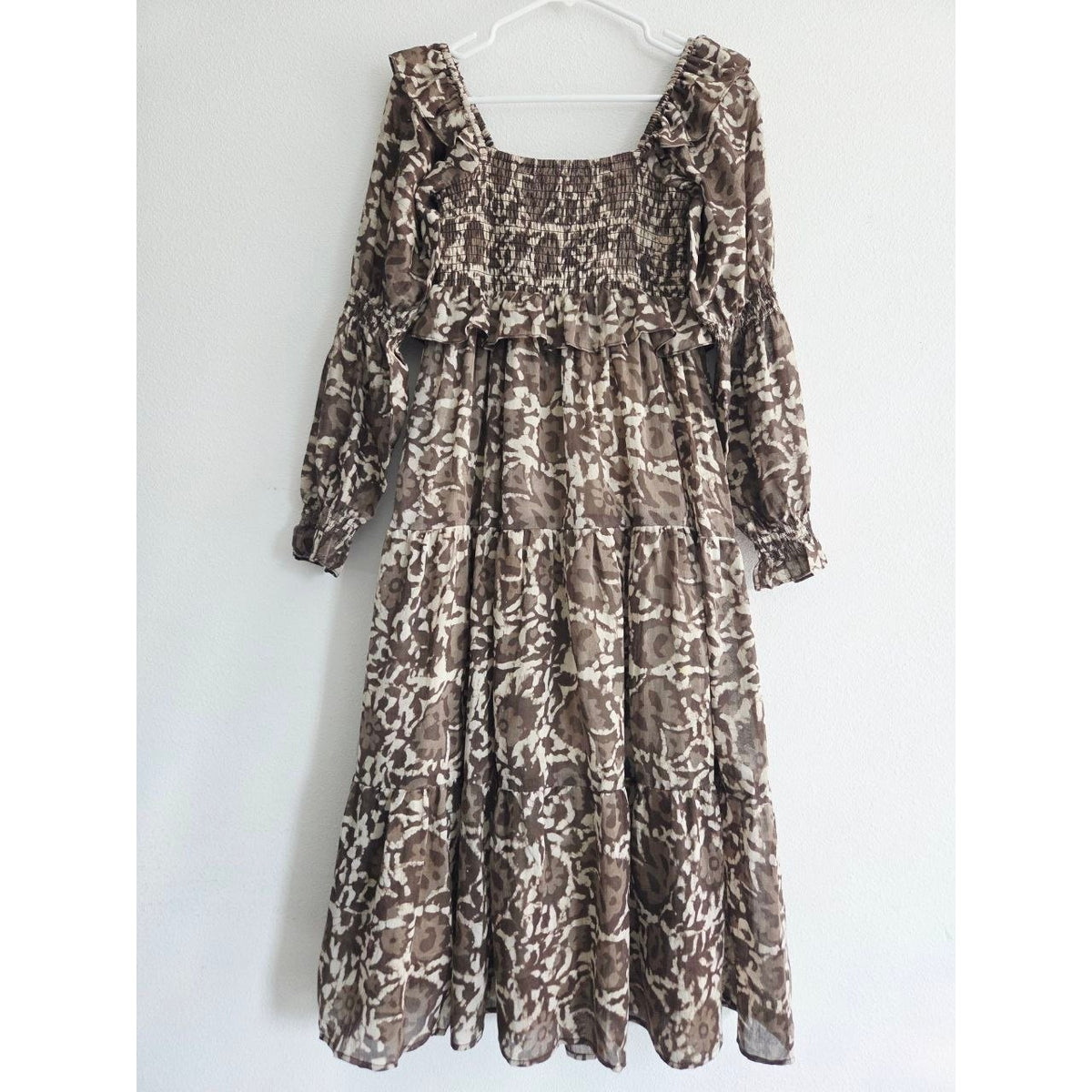 Reverse view on hanger of Frances Hart Maxine floral maternity dress