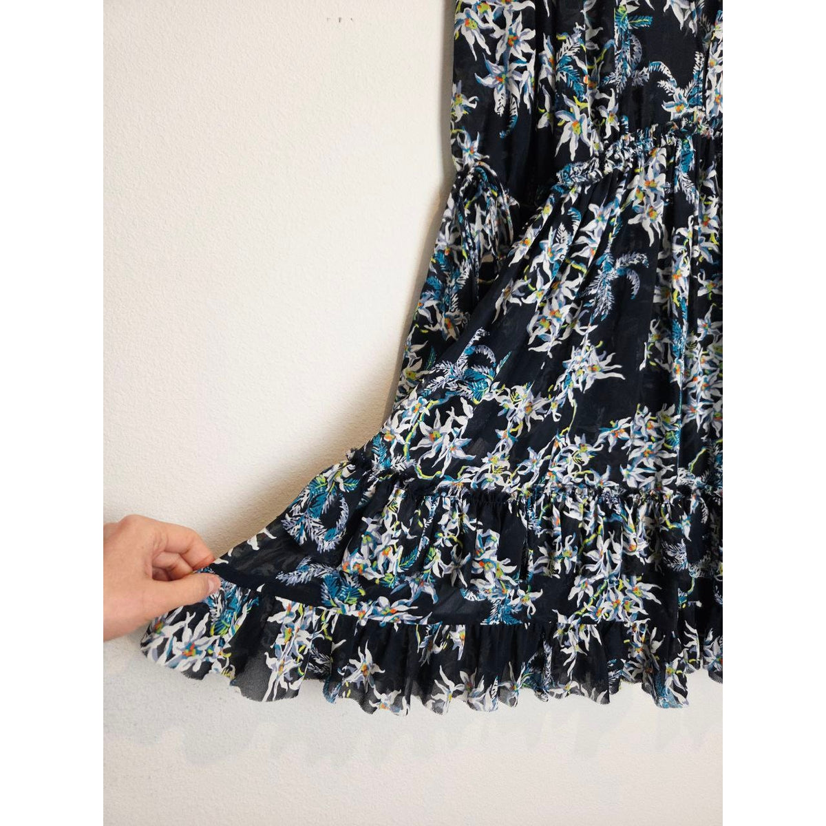 Ruffled hem of Cinq à Sept Lyra navy floral mini dress