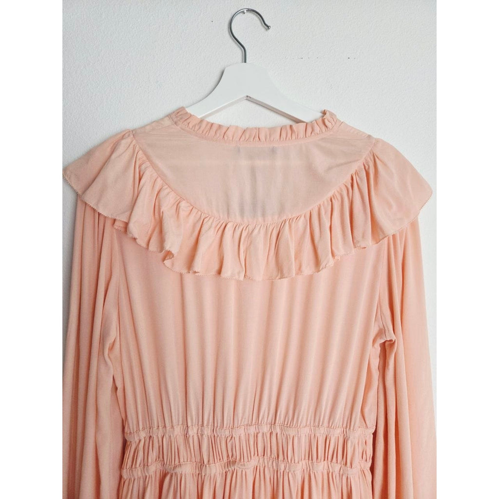 Back collar and waist detail of Maje Riava blush mini dress