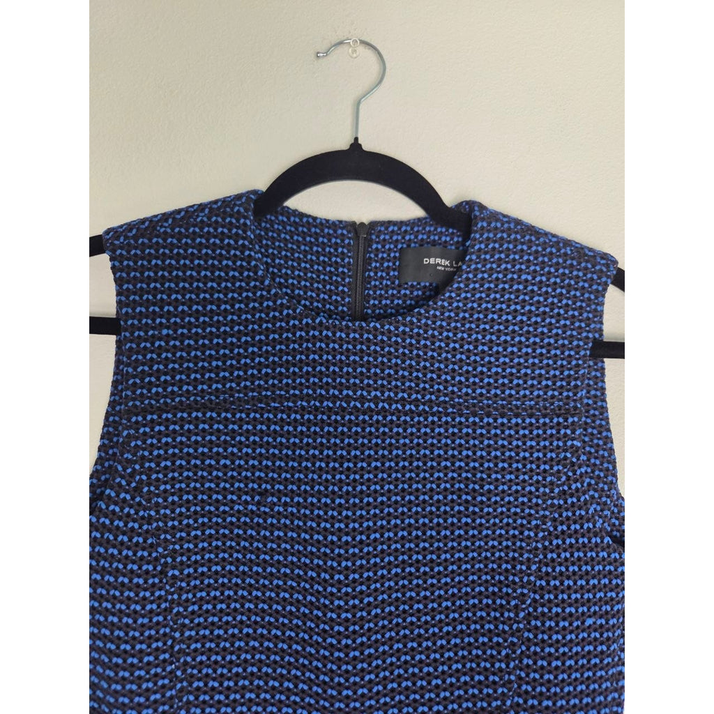High neckline and textured bodice of Derek Lam blue and black sheath dress