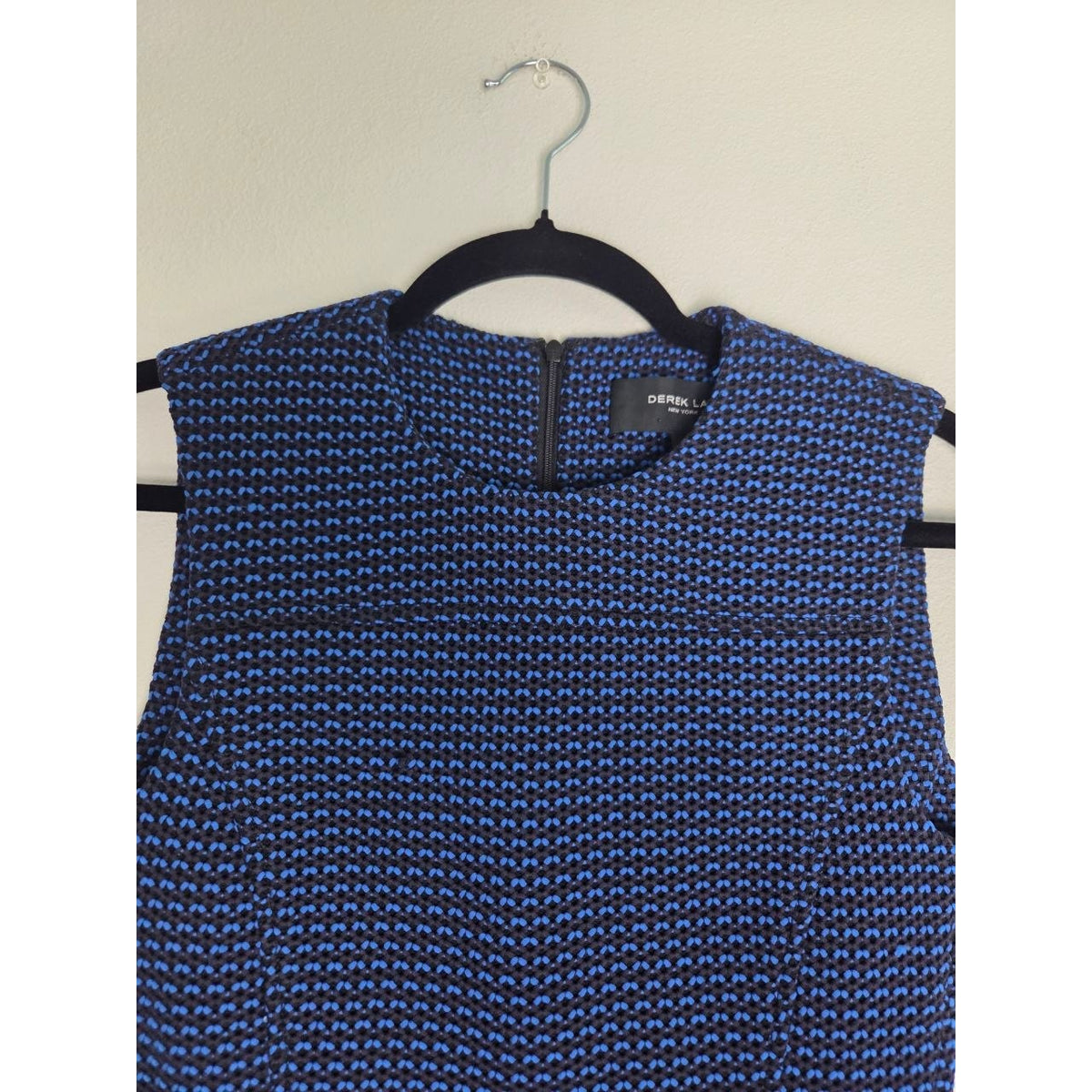 High neckline and textured bodice of Derek Lam blue and black sheath dress