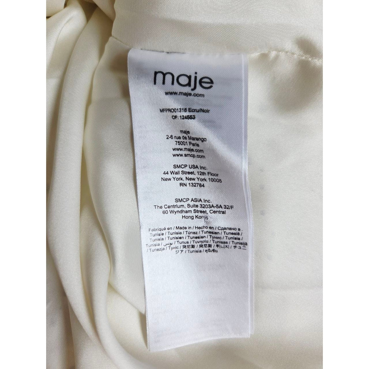 Garment information label of Maje Reto ecru star-print dress