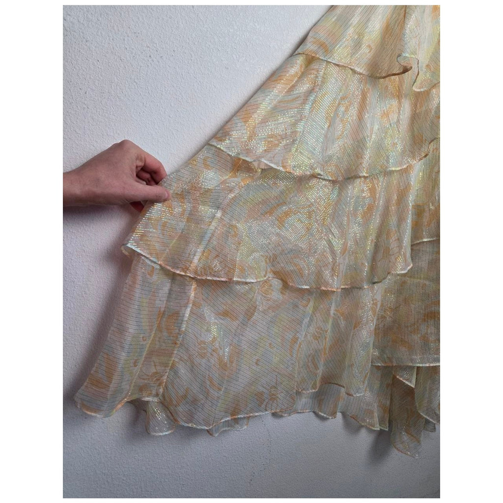 Ruffle hem close-up of Maje Rufflino metallic silk-blend maxi dress