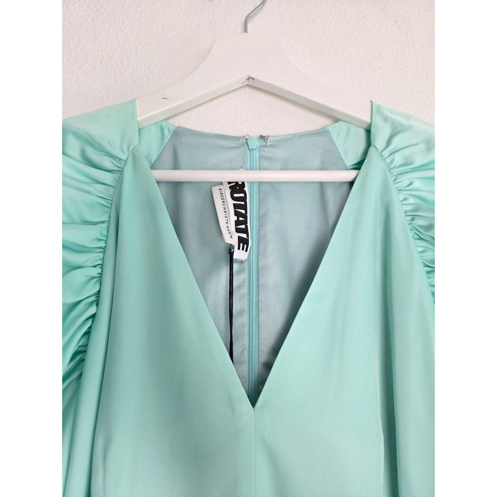 V-neckline detail of ROTATE Morning Mist aqua mini dress