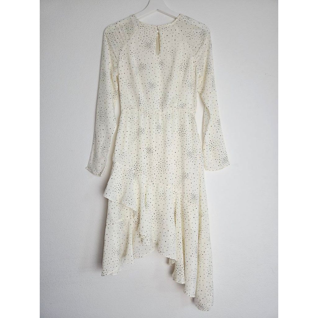 Back view on hanger of Maje Reto ecru star-print dress