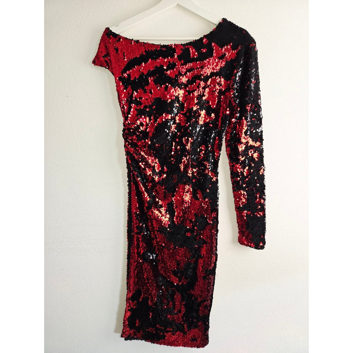 Back view on hanger of Delfi Valentina red and black sequin dress