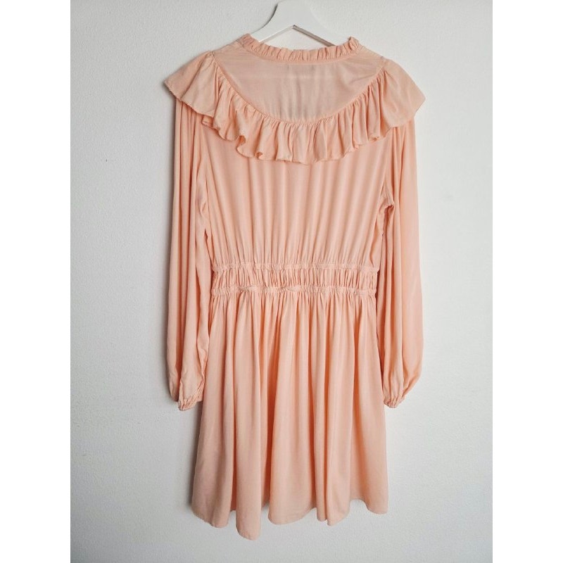Back view on hanger of Maje Riava blush mini dress