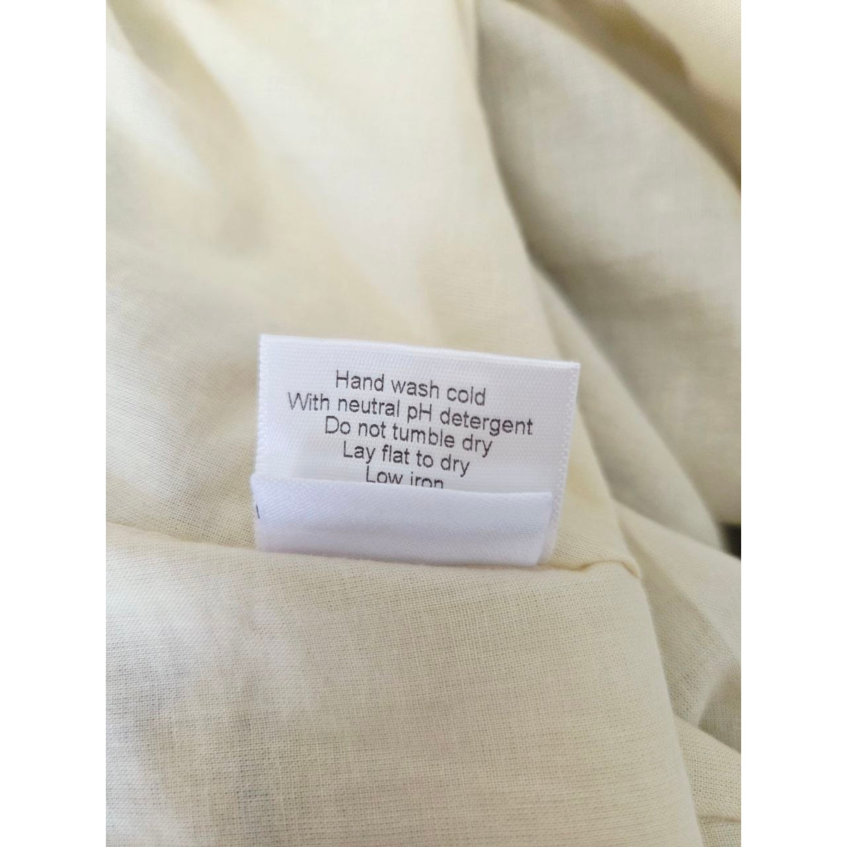 Care label of Frances Hart Maxine floral maternity dress