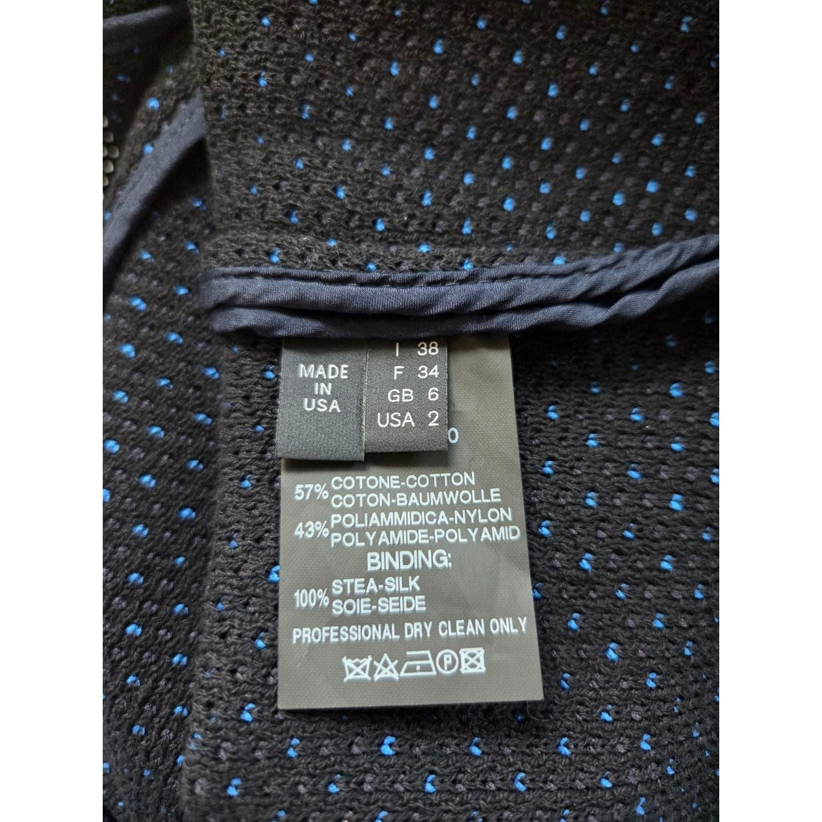 Size, composition and care label of Derek Lam blue and black sheath dress