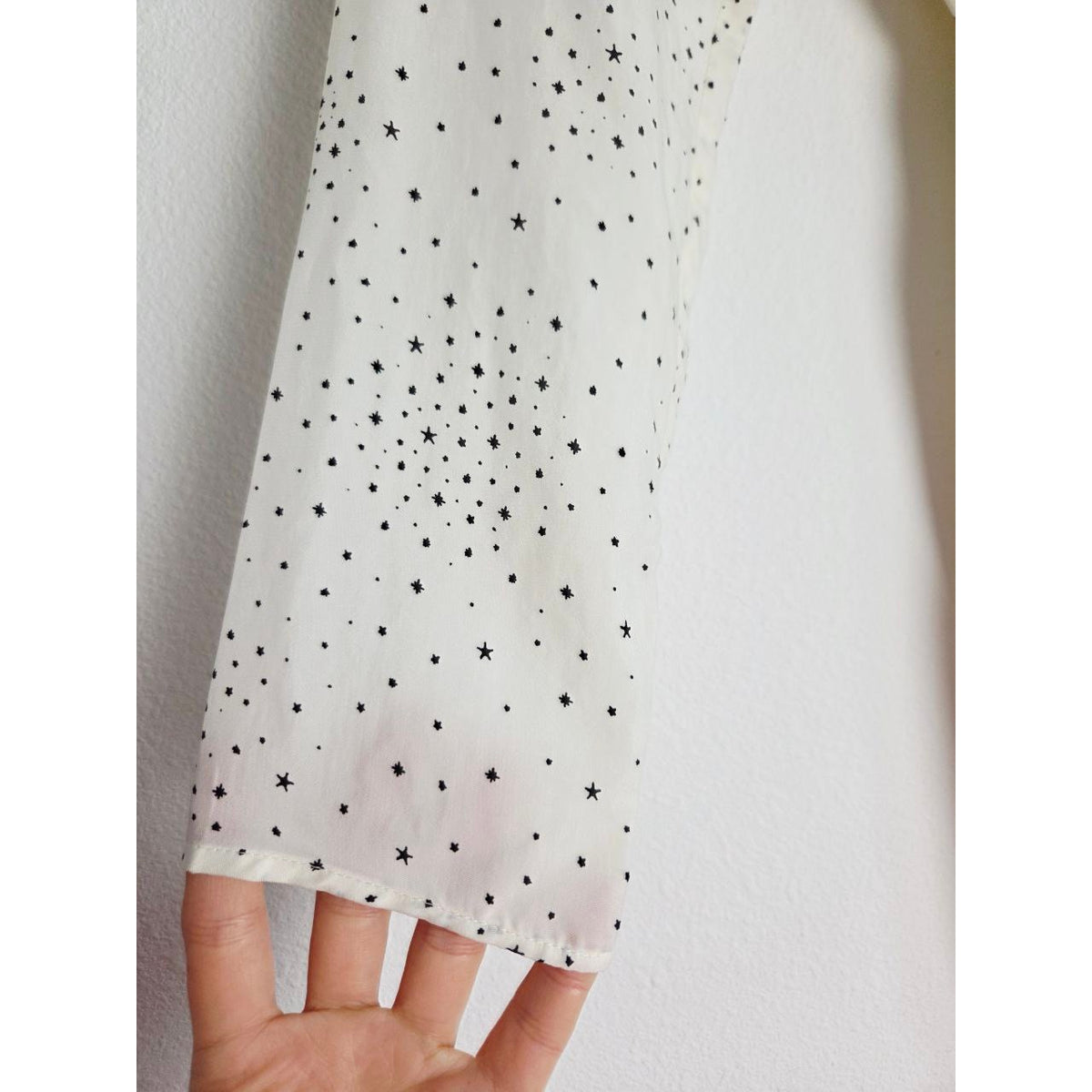 Star-print sleeve cuff of Maje Reto ecru star-print dress